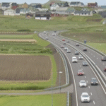 Verður Sandafløttur og øll veltan løgd undir asfalt og beton?